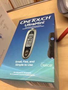 lot 27 image: OneTouch UltraMini and Blood Pressure Cuff with Bag