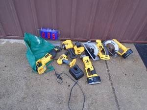Assorted Dewalt 18 volt tools with 2 batteries & charger. Battery appears low. As shown.