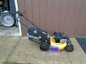 Craftsman Poulon pro self propelled lawn mower. Starts & runs. Has been sitting & may need carb cleaned. As shown.