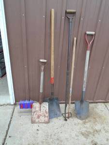 Assorted shovels, hoes, ice chisels. As shown.
