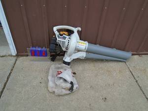 Ryobi gas blowervacuum with bag. Tested & works. As shown.