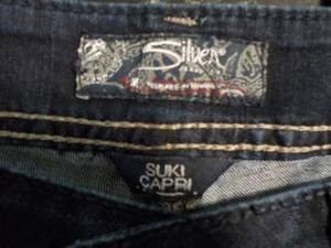lot 50 image: Silver Capris size W33...