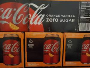 lot 265 image: 4 - 12 packs Coca Cola Orange Vanil...