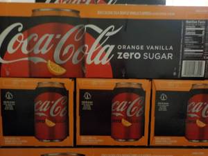 lot 266 image: 4 - 12 packs Coca Cola Orange Vanil...