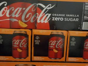 lot 267 image: 4 - 12 packs Coca Cola Orange Vanil...