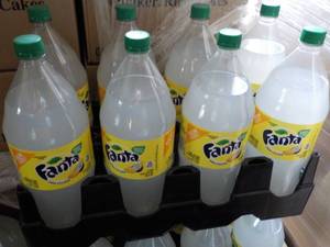 lot 336 image: 8 - 2 liter Bottles Fanta Pina Cola...