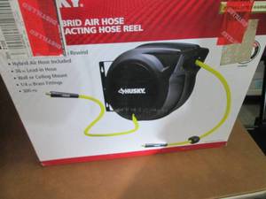 lot 19 image: Husky Air Hose and Reel open box, d...