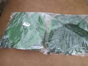 lot 49 image: 2- 48 pc Leaf Dcor Sets...