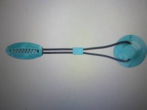lot 126 image: Pet Life Grip N Play Treat-Dispens...