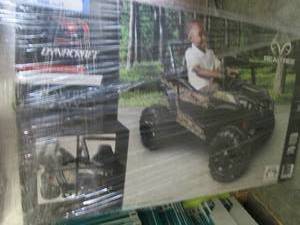 lot 248 image: 12V Realtree 4 Wheeler open box,  ...