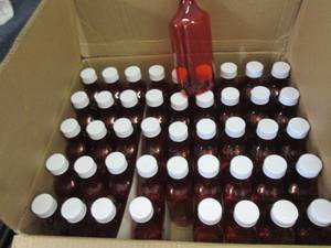lot 250 image: Case of 45 Ezy-Dose Amber Tone Plas...