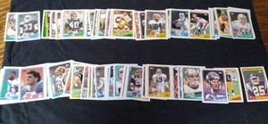 lot 21 image: 1988 Topps Football Cards (see phot...