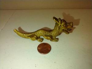 lot 174 image: Tiny Metal Asian Dragon