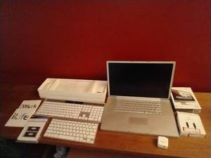 lot 371 image: Apple Lot - Macbook, Software, Accessories, Etc.