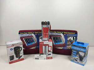 lot 18 image: Road Trip CollectionNEW In Boxes- 2 Pillow Pads Premier Mobile Universal 12 V Cup Beverage Warmer, Fine Life Stainless Steel Travel Mug, 2.5 Minute Fix-It Heated Car Mug