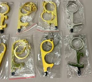 lot 64 image: Lot of 10 Touchless Door Openers w Stylists
