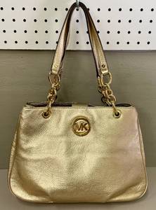 lot 6 image: Michael Kors Gold Handbag Purse