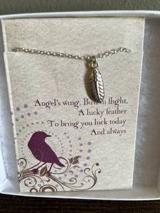 lot 10 image: 14ct. Gold Shell Earrings and Silver Feather Necklace
