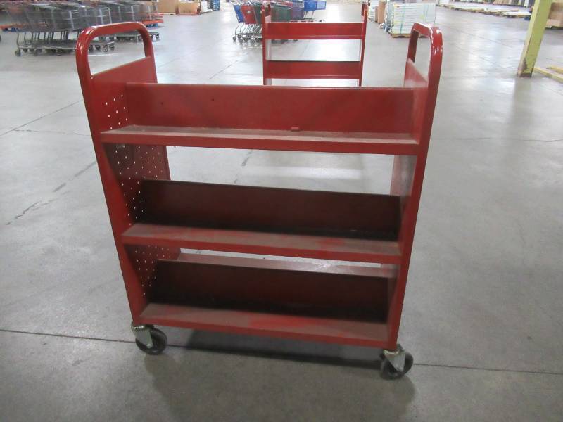 lot 134 image: Rolling Utility Cart With Shelves On Either Side. Dimensions 36 x 18 x 46 14 Tall.