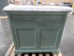 lot 224 image: Home Decorators Collection Windlowe 37 in. W x 22 in. D x 35 in. H Bath Vanity in Green with Carrera Marble Vanity Top in White with White Sink - Water Damage and cracking on sides.