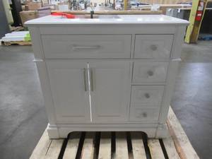 lot 225 image: Home Decorators Collection Melpark 36 in. W x 22 in. D Bath Vanity in White with Cultured Marble Vanity Top in White with White Sink - Some Scratchesslight damage n RH Bottom Side.