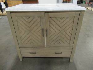 lot 226 image: Home Decorators Collection Sedona 37 in. W Vanity in Fawn Grey with Faux Marble Vanity Top in White with White Basin - Top is Cracked.