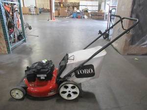 lot 7 image: Toro Recycler 21 in. Briggs & Stratton High Wheel Gas Walk Behind Push Lawn Mower with Bagger, 21332. Runs Rough.
