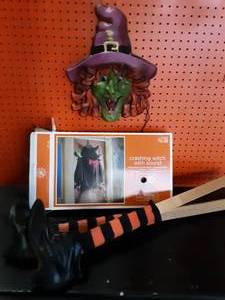 lot 11 image: Crashing Witch With Sound (Crashing & Talking Sounds), Lighted Witch, Pair Of Witch Legs