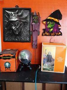 lot 16 image: Battery Operated Spirit Ball, Lighted Witch, Hex Harridan Witch, Lawn Stake Whirly Witch, Large Molded Plastic Witch 20x24