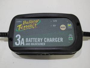 lot 879 image: Deltran Battery Tender Power Plus 3 Amp Battery Charger and Maintainer for RV, Classic Car, Winter Storage