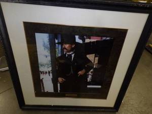 lot 49 image: Tombstone Framed Print from Aladdin Hotel in Las Vegas
