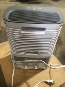 lot 27 image: Crane 4 Pint Compact Dehumidifier with 2 Settings for Small to Medium Rooms up to 300 sq. ft.