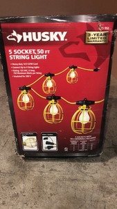 lot 38 image: Husky 50 ft. 5-Bulb String Caged Work Lights