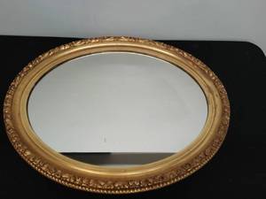 Gold Trimmed Oval Mirror