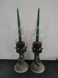 Two Cast Metal Candleholders
