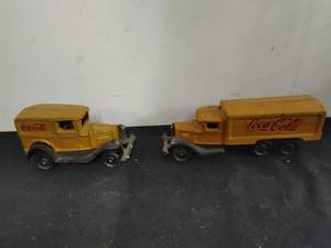 Two Cast Iron Coca-Cola Trucks