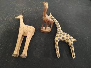 Three Carved Wood Giraffes