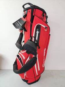 lot 04 image: Tayor Made Red Flextech Stand Golf BagNever Used Tags Still on (Valued  $209)
