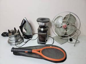 lot 122 image: Awesome Vintage Professional Housewares- Everything WorksWaring Commercial Drink Blender Base ,Electric Fly Swatter,1950s GE Fan, Cuisinart Coffee Grinder, Living Solutions Steam Iron