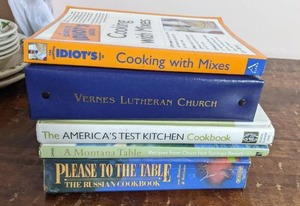 lot 101 image: 5 Vintage Cookbooks -The Complete Idiots Guide to Cooking With Mixes, Vernes Lutheran Church Recipes From The Heart ,The Americas Test Kitchen Cookbook, A Montana Table Recipes From Chico Hot Springs, Report Please To The Table The Russian Cookbook