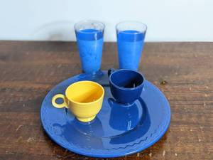 lot 29 image: Gorgeous Vintage Yellow and Blue Collection- Fiestaware And More2 Fiestaware Teacups 2.75 Large Cobalt Blue Plate 12, 2 Blue and Clear Glasses 5.5
