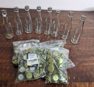 lot 170 image: 8 Glass Soda Bottles and Caps, 20 Assorted Glasses