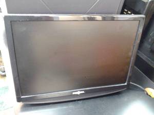 lot 18 image: Insignia LCD TV Model# NS-LCD19-09. Lot 23