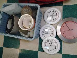 lot 28 image: Heavy Duty Bin Including Light Globes, Wall Clocks, Ceramic Planters, Etc.