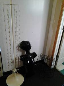 lot 103 image: Retail Rotating Display Rack and Wire Display Basket with Female Body Home Decor