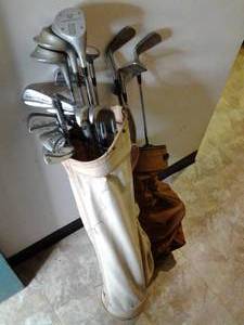 lot 139 image: Set of (2) Vintage Golf Bags with Clubs 