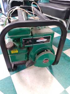 lot 52 image: Coleman Powermate Electric Generator 