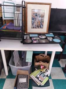 lot 57 image: White Ikea Table and ALL the Contents Cork Board, Storage, Tote, Photo Frame, Etc. 