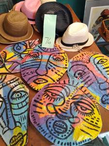 lot 76 image: Several Mens and Womens Hats Along with Unique Home Decor 
