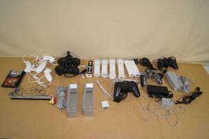 lot 105 image: Assorted Video Game Wires and Accessories - Genesis, Wii